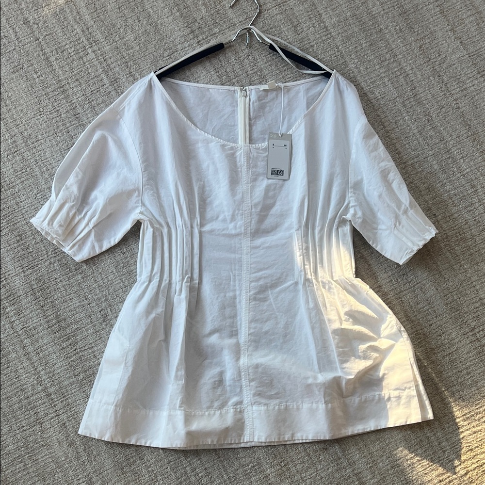 NWT short sleeved top by COS - size 12